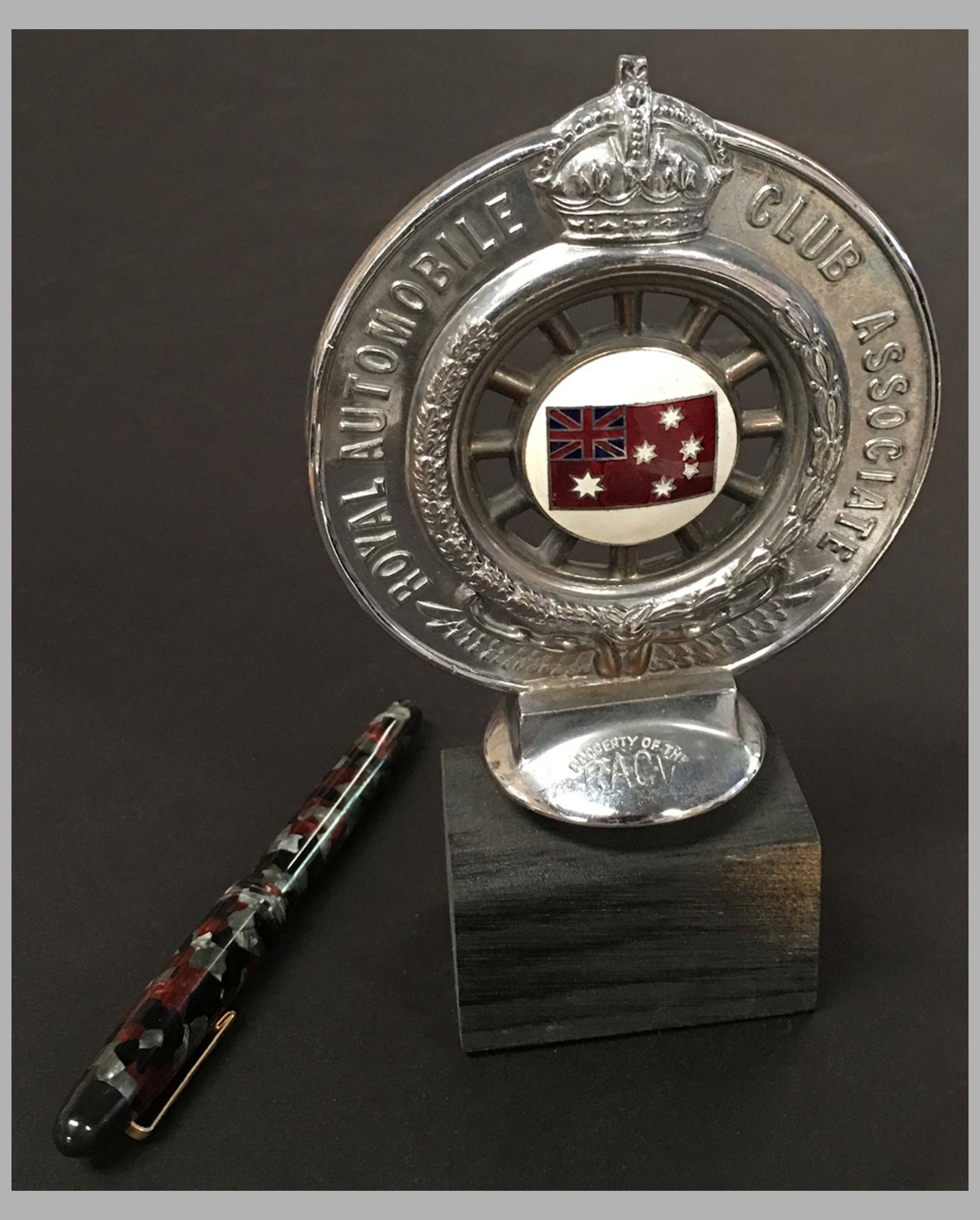 Royal Automobile Club of Victoria Australia hood ornament on wooded base, back
