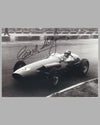 Carroll Shelby driving his Aston Martin DBR1 Formula 1 car, autographed b&w photograph