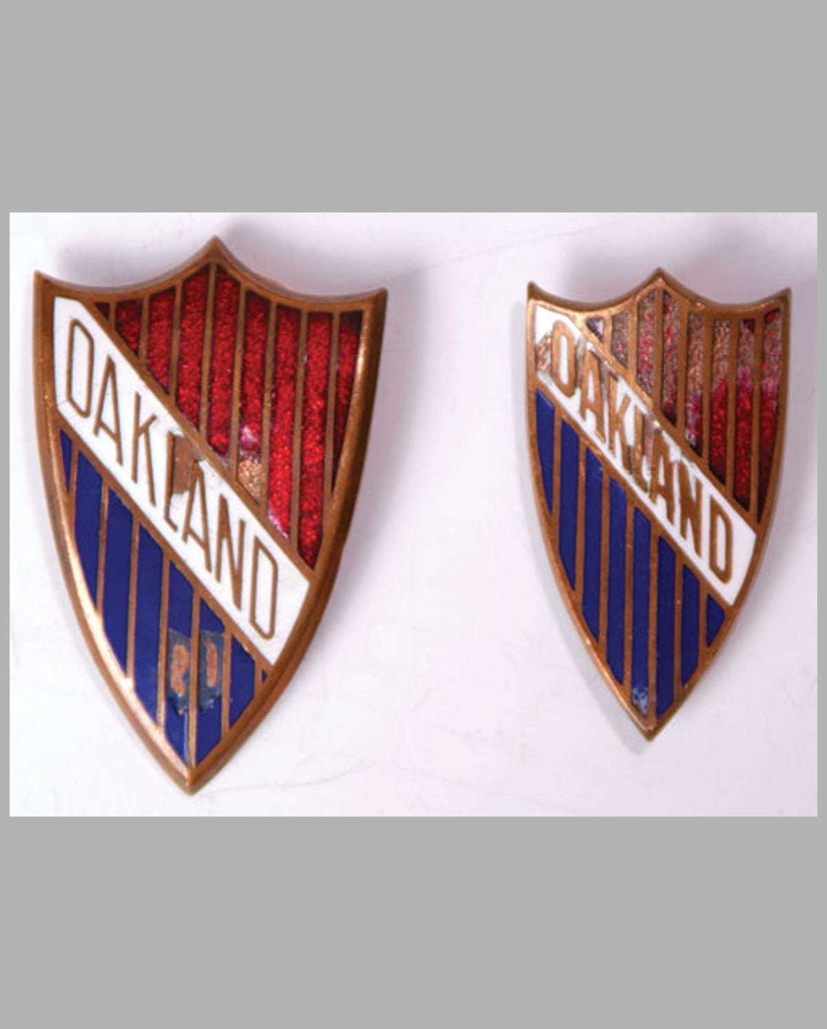 Two Oakland badges