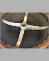 Vintage wood and metal steering wheel close-up
